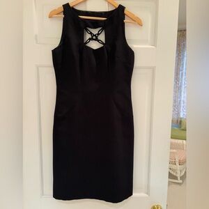 Cute black dress, never worn and a size small!